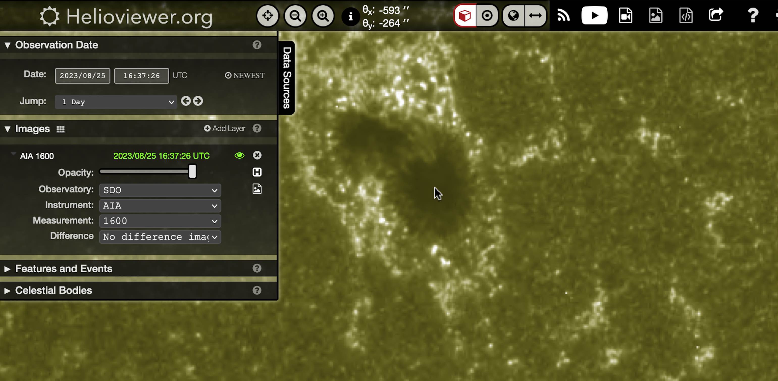 Image of the mouse hovering over a sunspot on helioviewer with the top bar showing coordinates (-593, -264) arcseconds